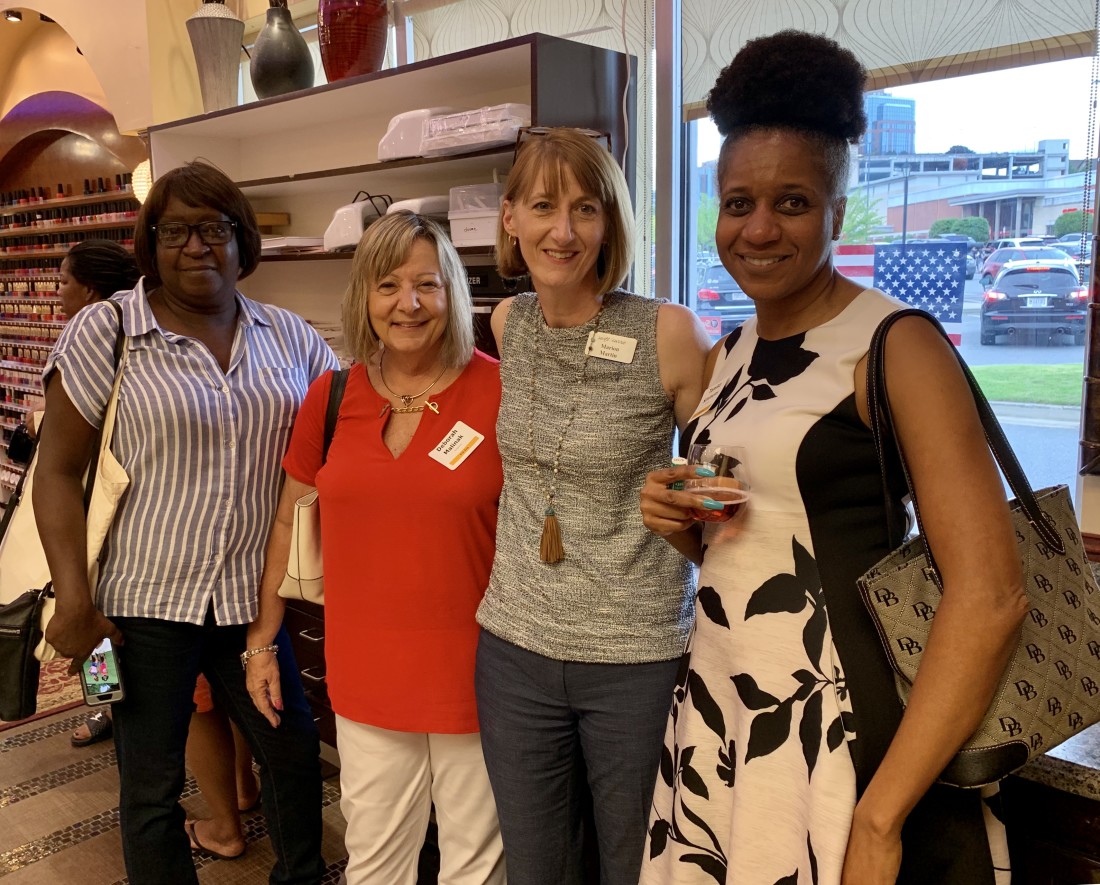 Attorney Marion Martin with clients at Swift Currie Client Appreciation Event