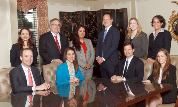 Swift Currie McGhee & Hiers, personal injury defense group, (seated, from left) Drew Timmons, Pamela Lee, Terry Brantley and Eleanor Jolley, (back row, from left) Ashley Alfonso, Roger Harris, Nelufar Agharahimi, Lee Clayton, Jennifer Nichols and Melissa Segel.